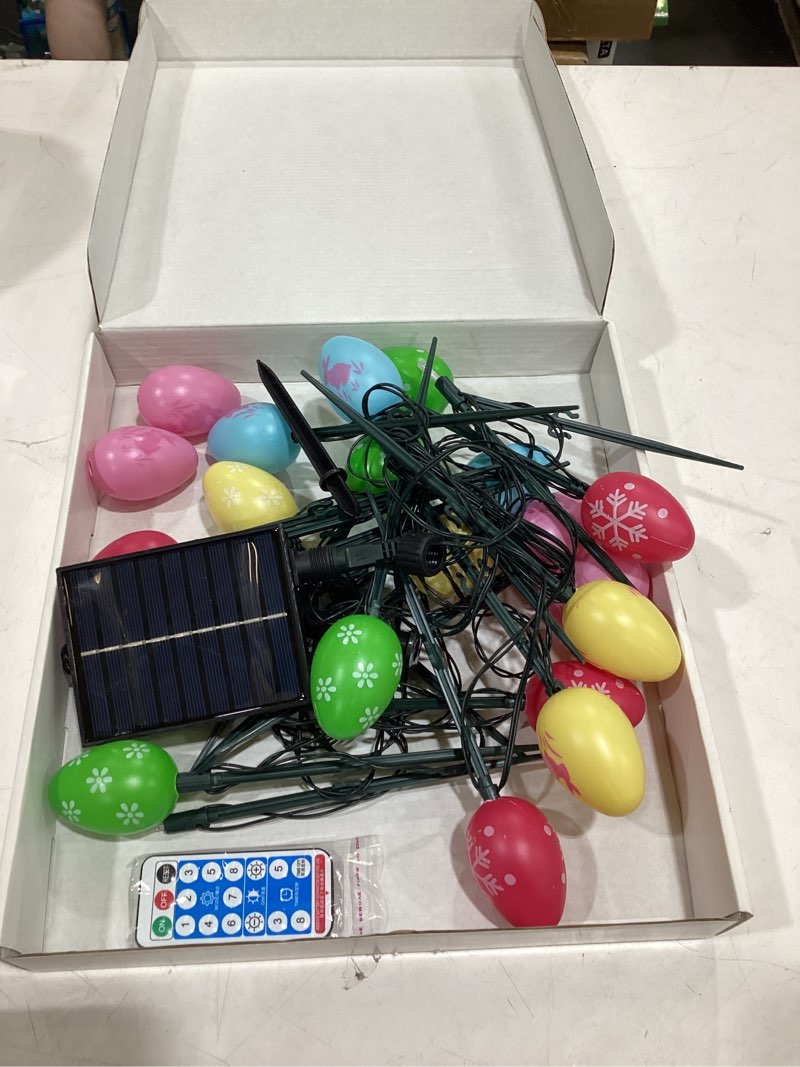 Condition photo showing Good Condition for 25 ft 20 packs easter eggs decor string lights, 8 modes colorful easter solar light outdoor, waterproof stake egg pathway light for garden patio lawn yard