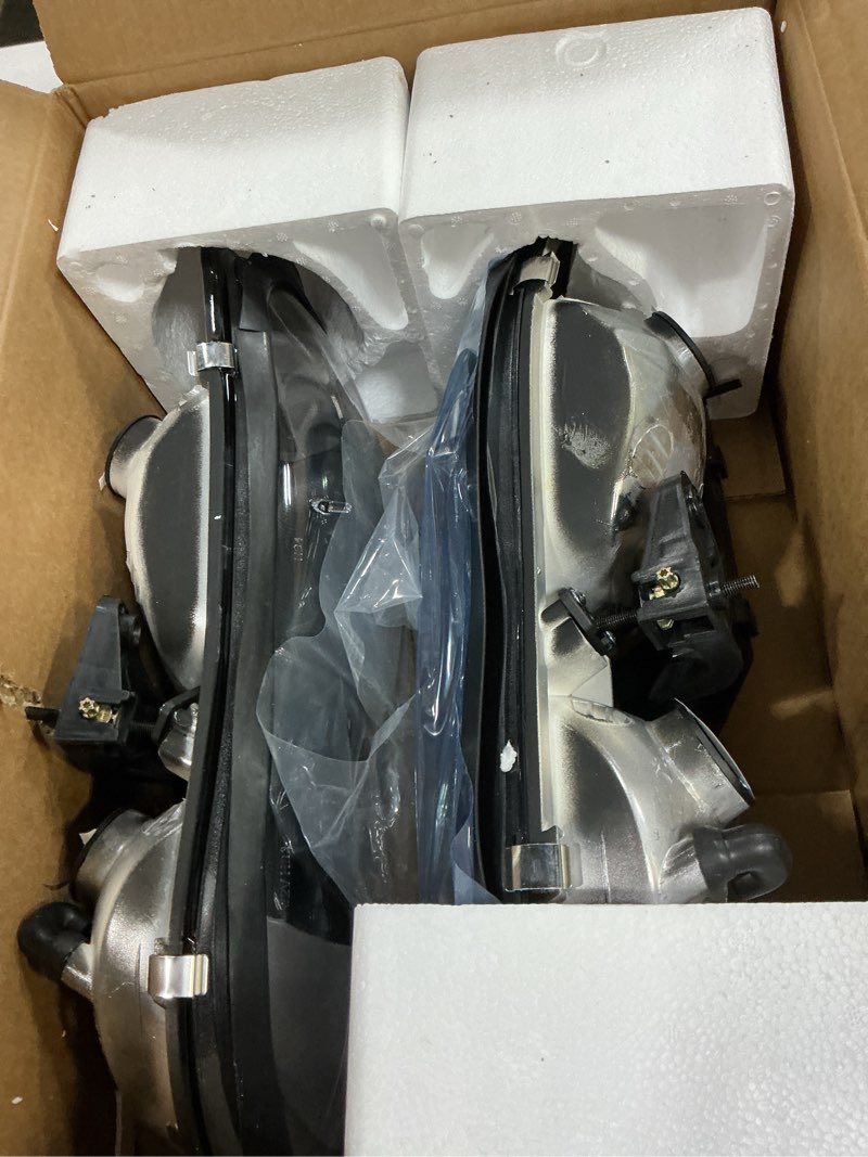 Condition photo showing New/Like New for headlight assembly for 1998-2002 chevy camaro compatible with 1998 1999 2000 2001 2002 chevy camaro clear lens black housing clear reflector headlamp replacement left and right