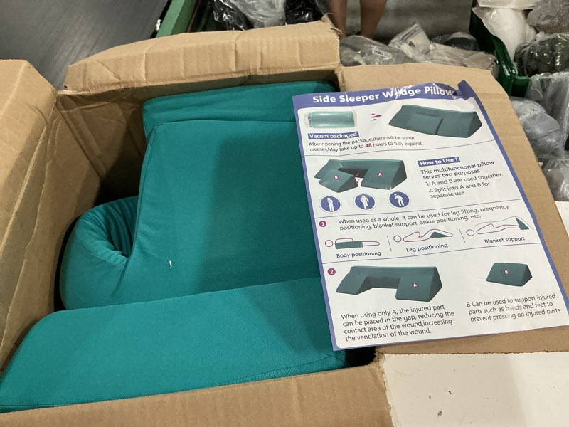 Condition photo showing As Is for positioning wedge pillow for side sleeping
