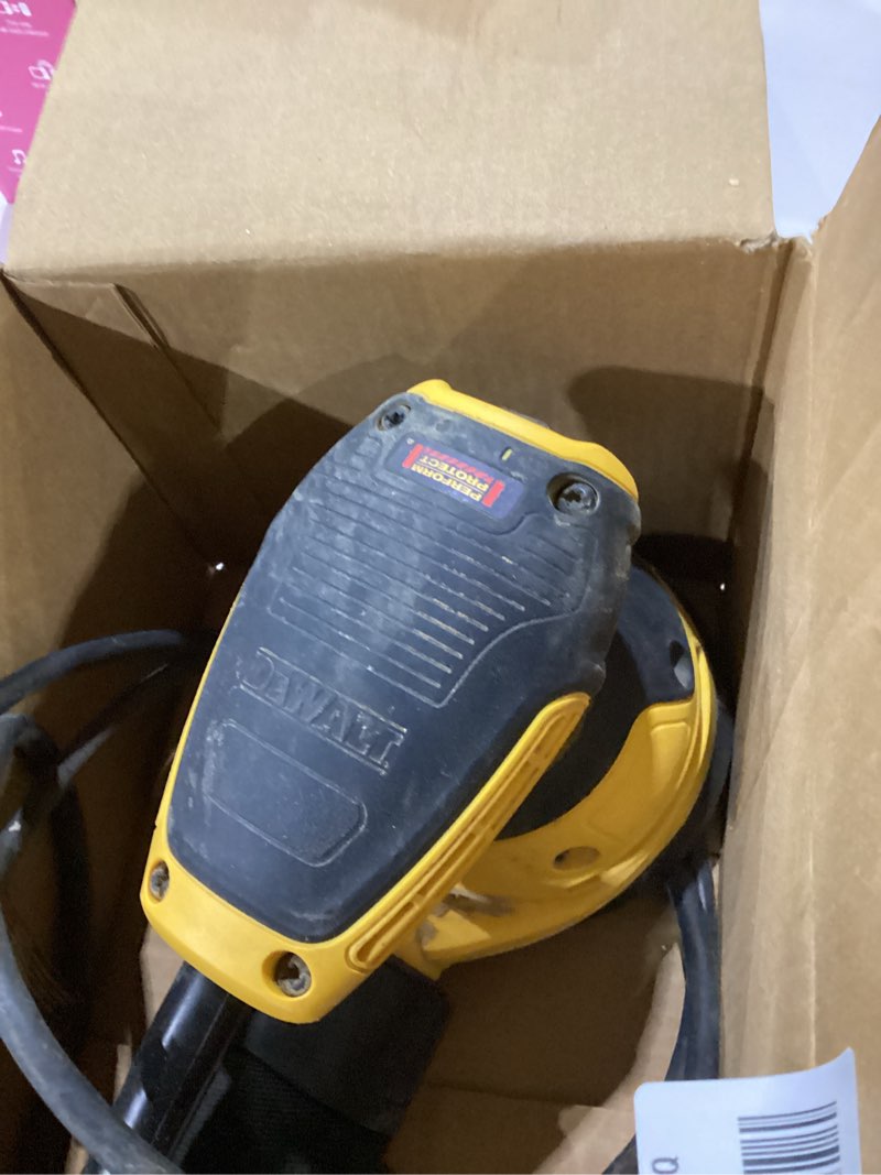 Condition photo showing As Is for not tested ***dewalt orbital sander kit, 5 inch, 3 amp, corded, 12,000 opm (dwe6421k)