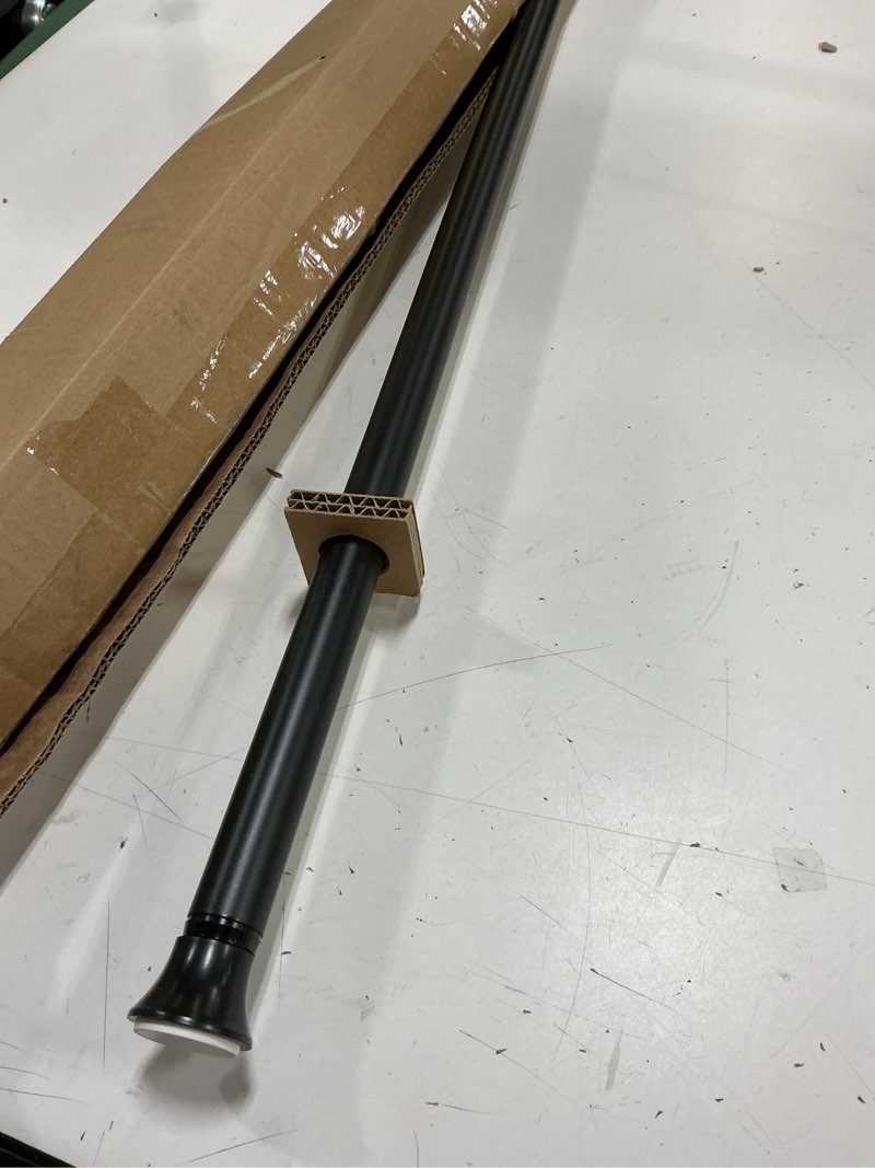 Condition photo showing Good Condition for amazon basics adjustable sturdy spring tension curtain rod, no drilling/no holes, 54-90", black, classic finial black 54-90" indoor