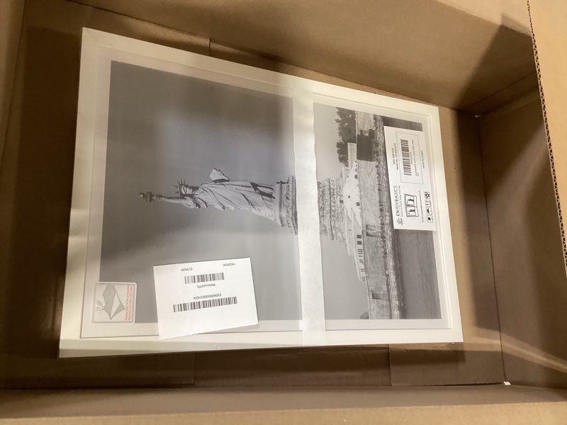 Condition photo showing New/Like New for enjoybasics 12x18 picture frame, display for 12 x 18 poster, wall gallery photo frames, white, 2 pack white 12x18