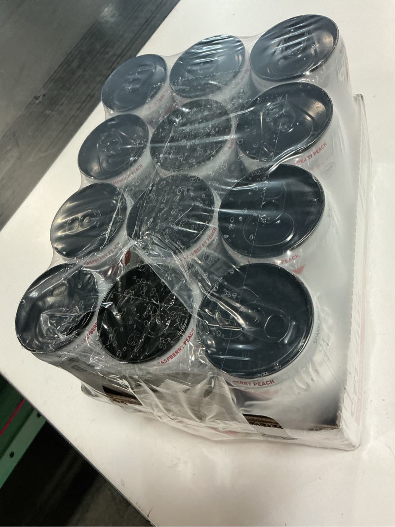 Condition photo showing New/Like New for (Exp 03-2027)CELSIUS Sparkling Raspberry Peach, Sugar Free Energy Drink, 12 Fl Oz (Pack of 12) Raspberry Peach 12 Fl Oz (Pack of 12)