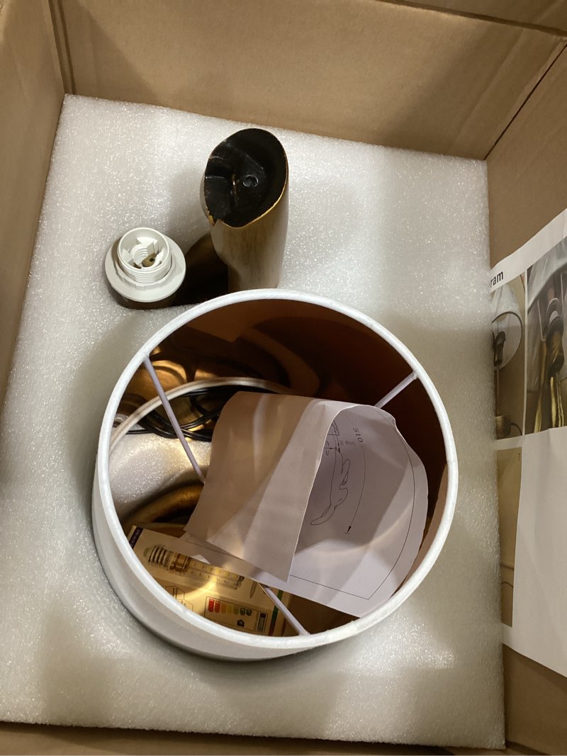 Condition photo showing New/Like New for modern lamp, gold, rabbit, shade included
