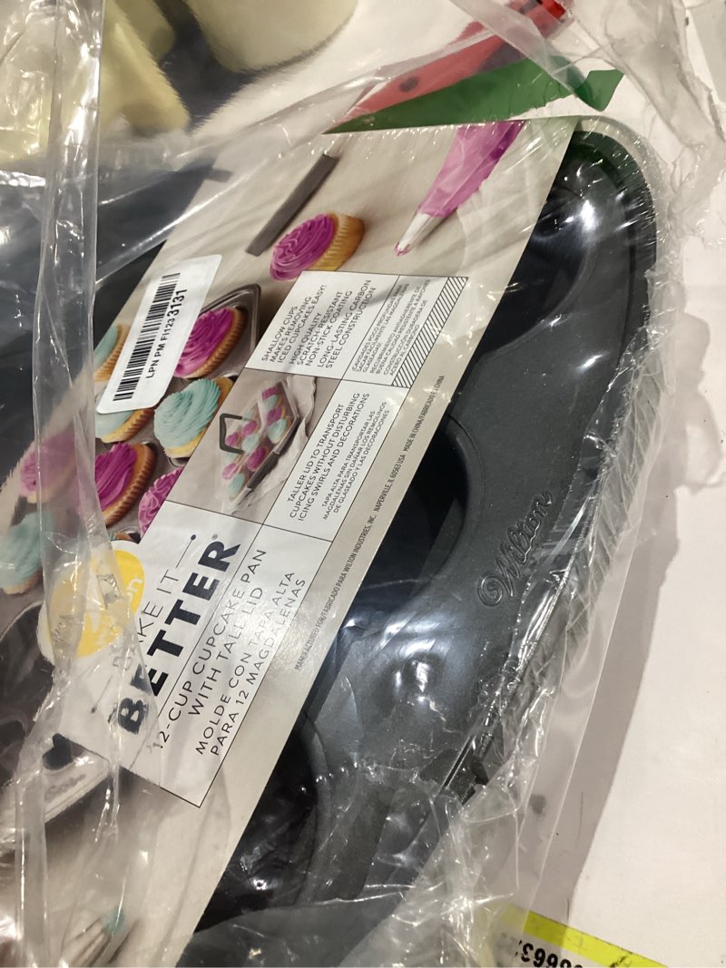 Condition photo showing New/Like New for Wilton Cupcake Pan, 12 Cup Non-Stick Carbon Steel Cupcake Mold, cupcakke Pan for Baking and Decorating, Dishwasher Safe, Grey, 2.80 x 10.80 x 15.40 Inches, Gray