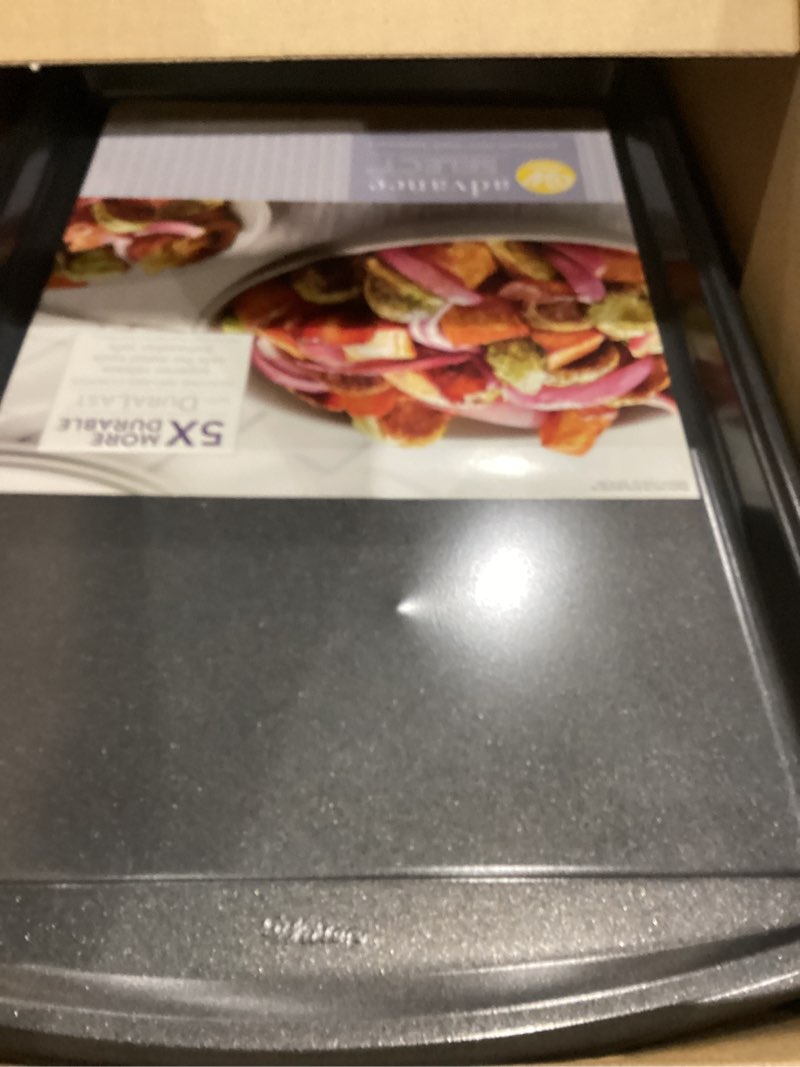 Condition photo showing Good Condition for Wilton Platinum Premium Non-Stick Anti-Warp Bakeware, Made without PFAs, Large Baking Sheet, 11x17 in 17.25 x 11.5 in.