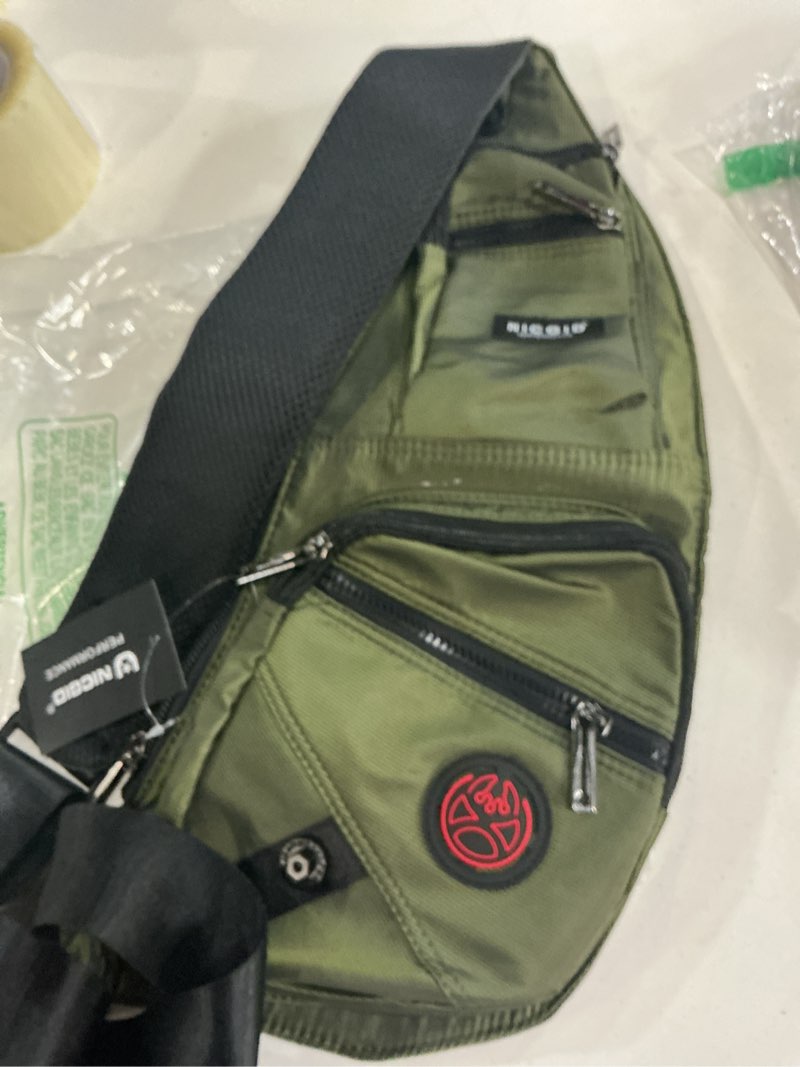 Condition photo showing New/Like New for nicgid sling bag chest shoulder backpack crossbody bags casual daypack for men women