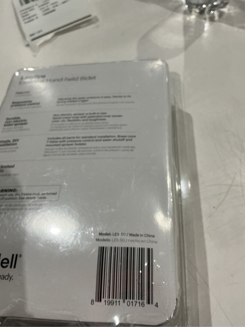 Condition photo showing As Is for brondell silver chrome toilet mounted handheld bidet sprayer