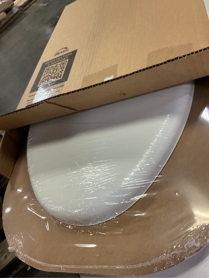 Condition photo showing Good Condition for mayfair padded toilet seat, cushioned soft vinyl over wood core seat, secure hinges, easy clean, elongated, white elongated white toilet seat