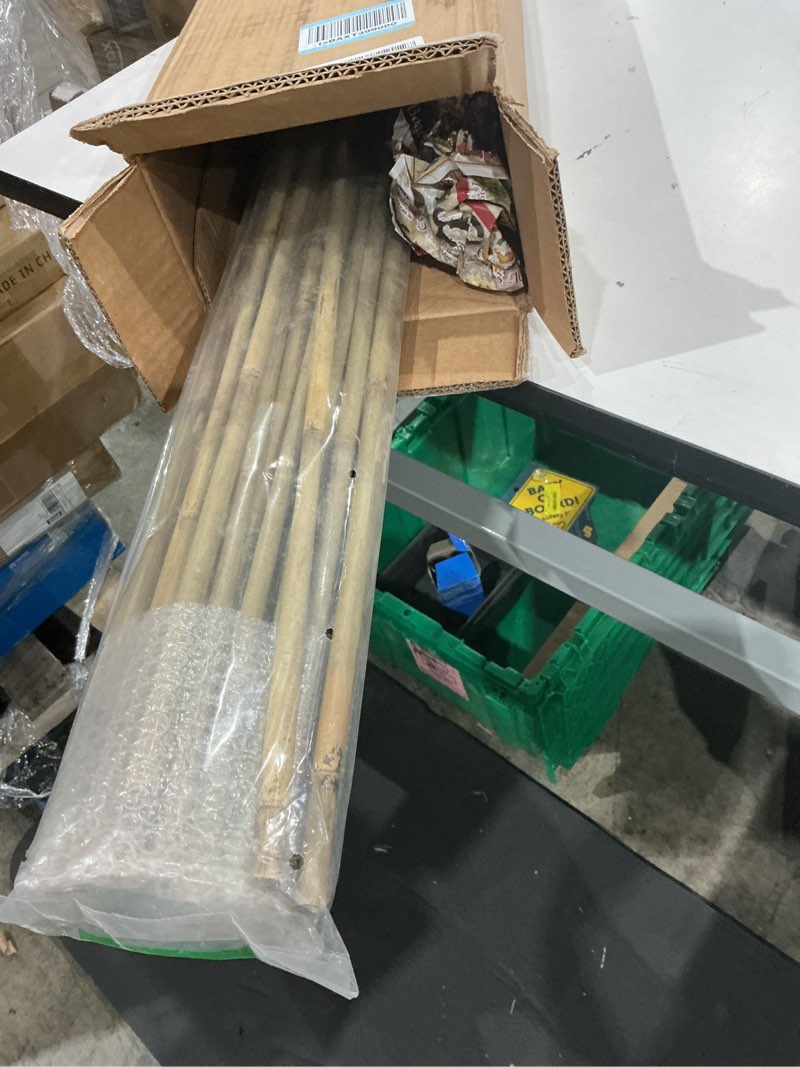 Condition photo showing As Is for 25pcs 1/2" d thicker heavy duty bamboo stakes, 4ft plant stakes, natural garden stakes for tomato, bean, flowers,trees potted and climbing plant support 4ft, pack of 25