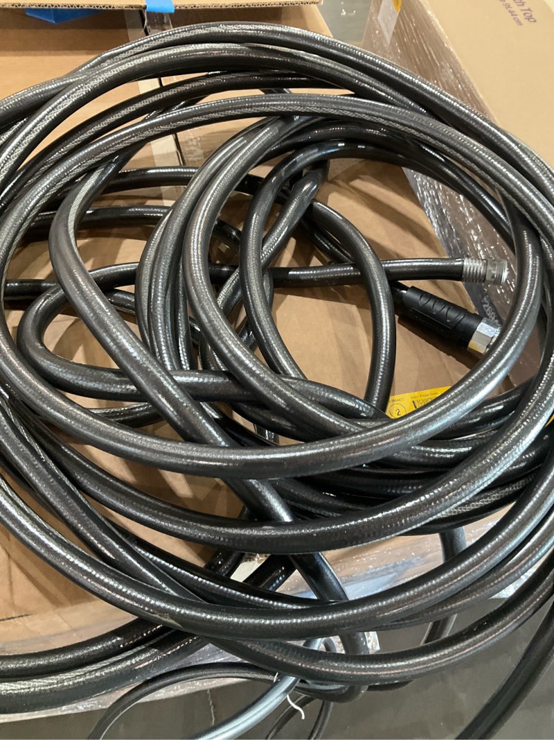Condition photo showing As Is for 100ft neverkink hose