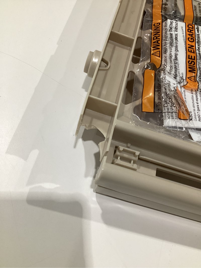 Condition photo showing As Is for (damaged)toddleroo by north states - supergate ergo baby gate: plastic baby gate for stairs & doorways - adjustable indoor safety gate - made in usa - 26 to 42 inches wide - 26 inches tall - sand