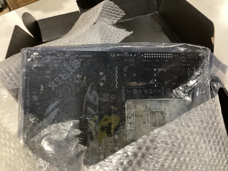 Condition photo showing As Is for not tested asus rog strix x870e-e gaming wifi amd am5 x870 atx motherboard 18+2+2 power stages, dynamic oc switcher, core flex, ddr5 aemp, wifi 7, 5x m.2, pcie® 5.0, q-release slim, usb4®, ai ocing & networking rog strix x870e-e|m.2x5