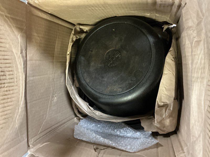 Condition photo showing As Is for Lodge 7-Quart Cast Iron Dutch Oven – Made in USA, Pre-Seasoned, PFAS-Free & Non-Toxic, Heat-Treated, Induction Compatible, Self-Basting Lid, Durable Multi-Use Cooking Pot for Oven to Table 7 Quart Dutch Oven