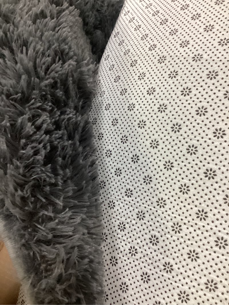 Condition photo showing Good Condition for rugberry 5x7 ft shag area rug dark grey