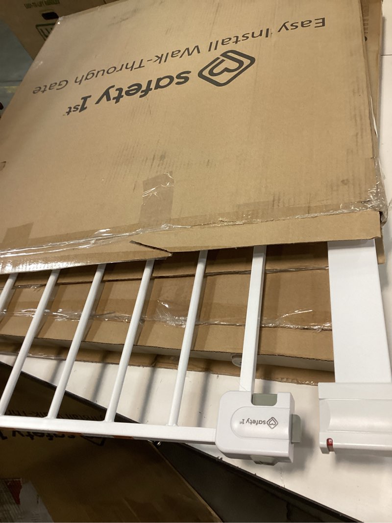 Condition photo showing As Is for Safety 1st Easy Install Walk Thru Baby Gate for Doorway With Door, Dog Gates, Fits 29"-38", Easy Install 28" Tall, White 1-Pack 29" to 38" Wide x 28" Tall White