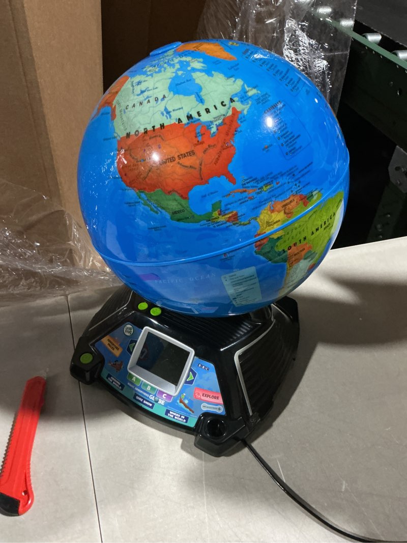 Condition photo showing As Is for leapfrog magic adventures globe with accessories, baby and toddler toys