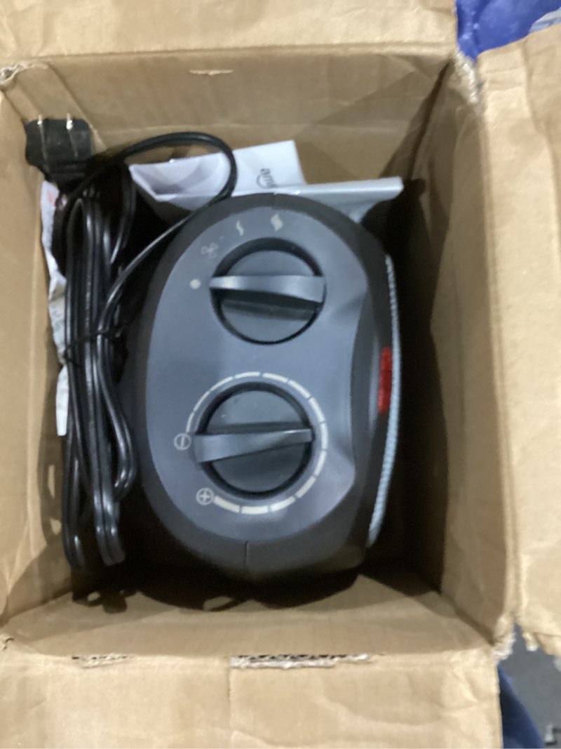 Condition photo showing Good Condition for amazon basics ceramic space heater, portable indoor heating solution, with overheat and tip-over protection, thermostat, non-oscillating, 1500w, 7.52"d x 6.34"w x 9.45"h, black non-oscillating black