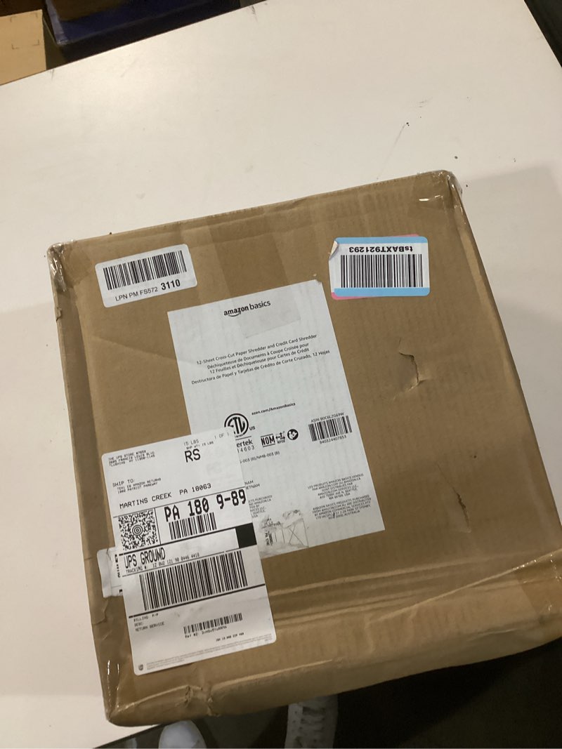 Condition photo showing item condition for Amazon Basics Cross Cut Paper and Credit Card Shredder, 12 Sheet (New Model), Black 12 Sheet Black