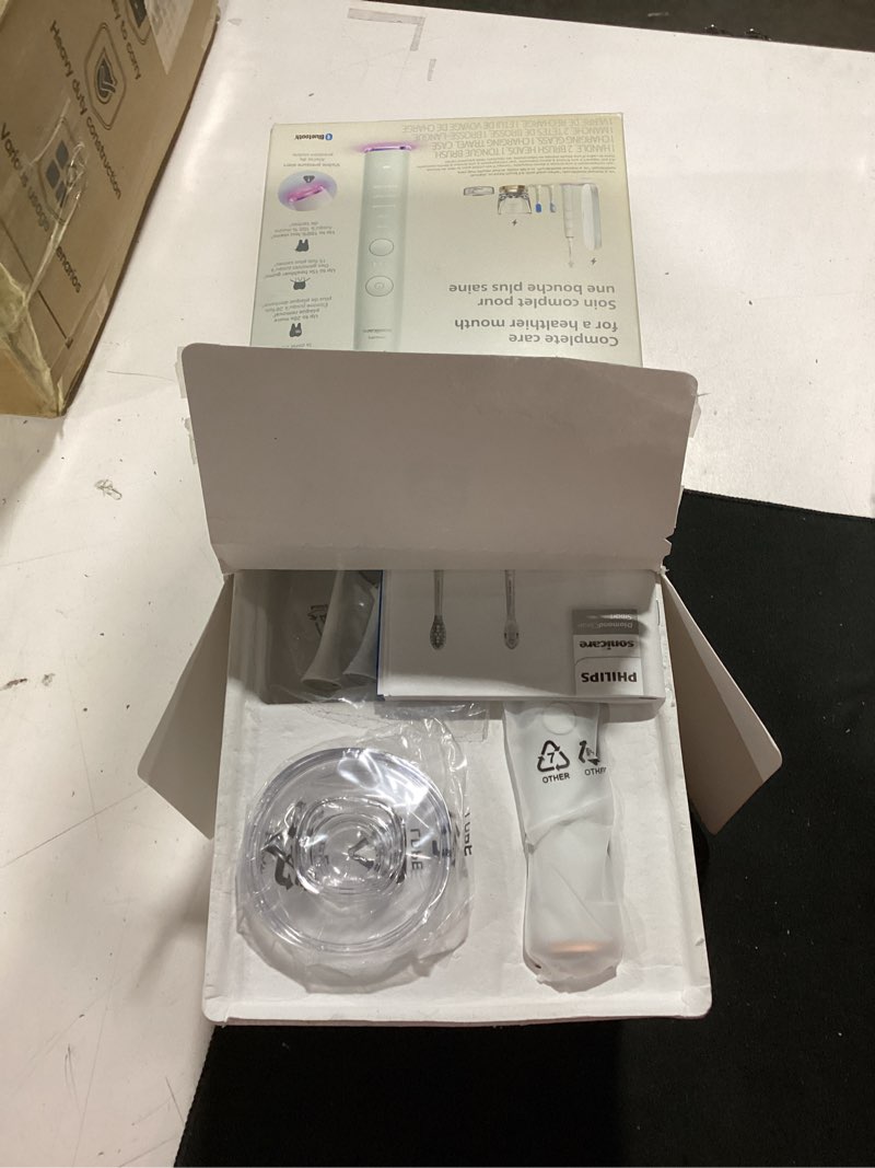 Condition photo showing New/Like New for philips sonicare diamondclean smart 9500 electric toothbrush, sonic toothbrush with app, pressure sensor, brush head detection, 5 brushing modes and 3 intensity levels, rosegold, model hx9923/61 1 count (pack of 1) new rose gold