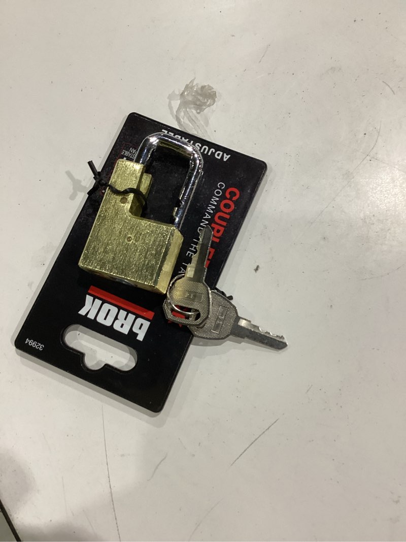 Condition photo showing As Is for brok lock adjustable coupler