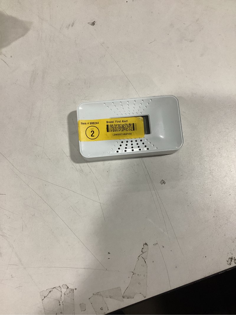 Condition photo showing As Is for First Alert CO710 Carbon Monoxide Detector with 10-Year Battery and Digital Temperature Display , White