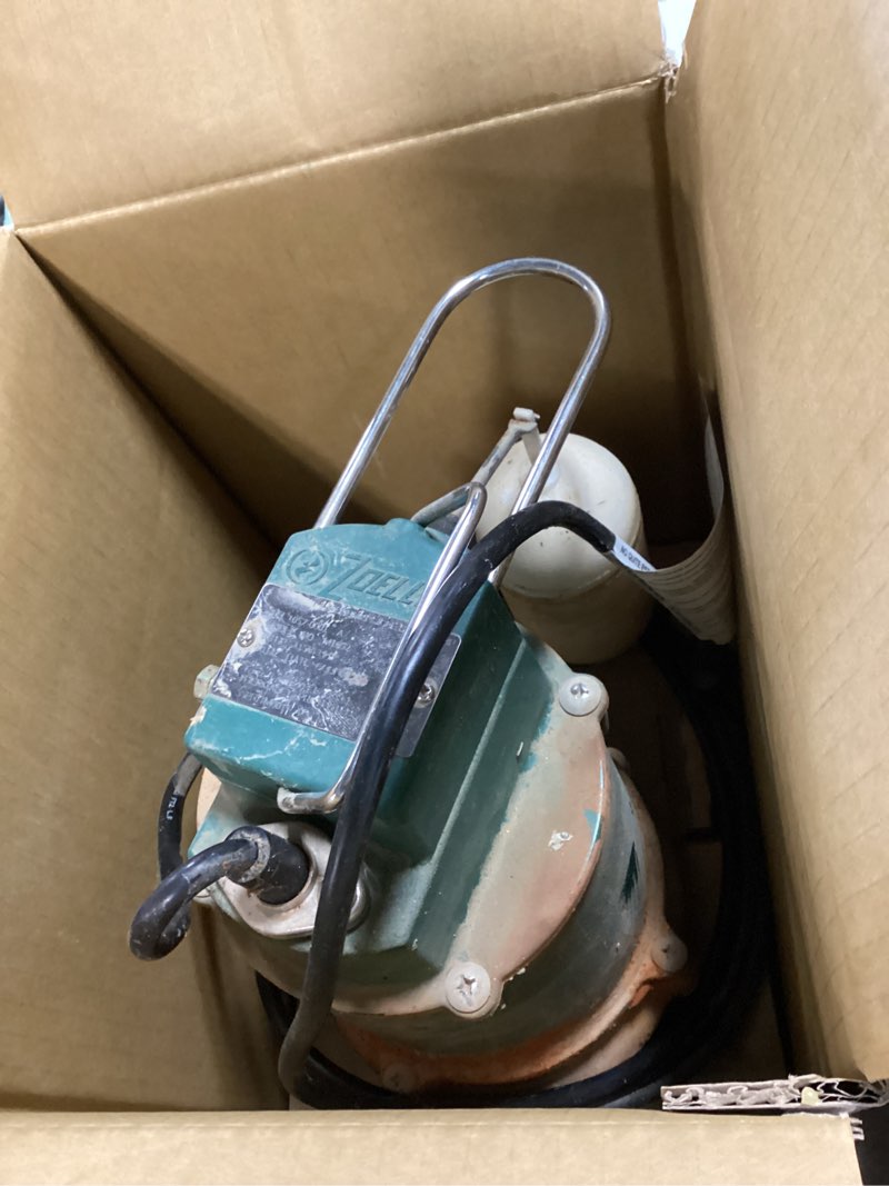 Condition photo showing As Is for zoeller 0.33-hp 115-volt cast iron submersible sump pump