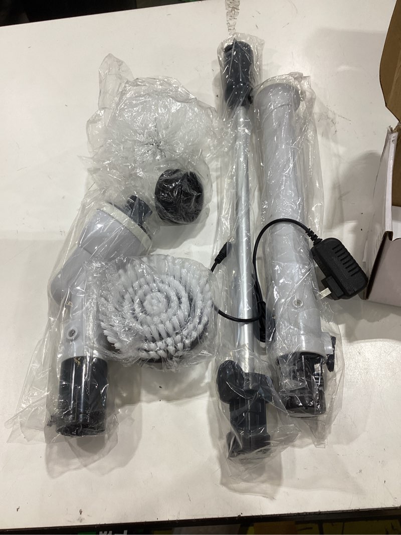 Condition photo showing As Is for rechargeable electric spin scrubber, cordless spin scrubber with 3 replaceable brush heads and adjustable extension handle, power cleaning brush for bathroom floor tile car