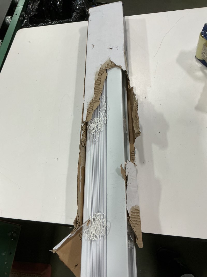 Condition photo showing As Is for Project Source Premium 2-in Slat Width 31-in x 64-in Cordless White Vinyl Room Darkening Plantation Blinds