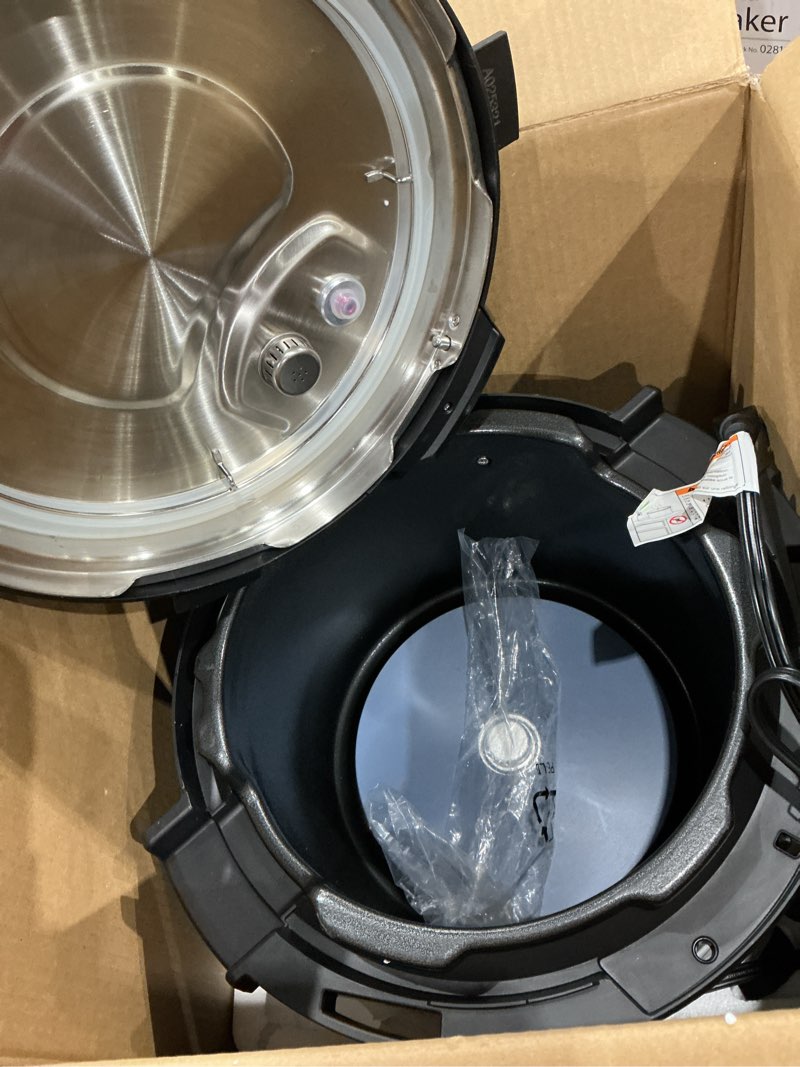 Condition photo showing As Is for instant pot pro (8 qt) 10-in-1 pressure cooker, slow cooker, rice/grain cooker, steamer, sauté, sous vide, yogurt maker, sterilizer, and warmer, includes app with over 800 recipes, black 8 quarts