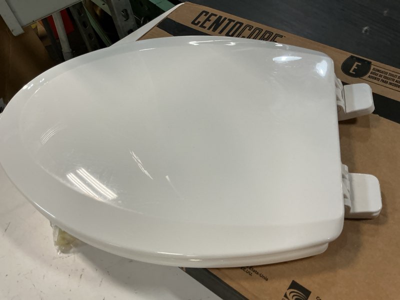 Condition photo showing Good Condition for centoco elongated toilet seat, heavy-duty wood core with plastic scratch-resistant finish, made in the usa, 900-001, white white standard elongated