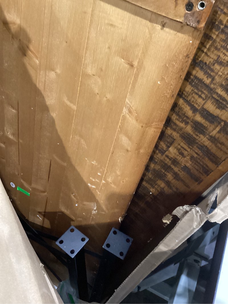 Condition photo showing As Is for olee sleep cocktail table with metal legs, rustic brown