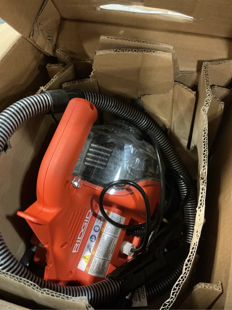 Condition photo showing As Is for ridgid 55808 powerclear 120-volt drain cleaning machine kit for tubs, showers, and sinks, drain cleaner machine kit with autofeed, inner core cable, and guide hose