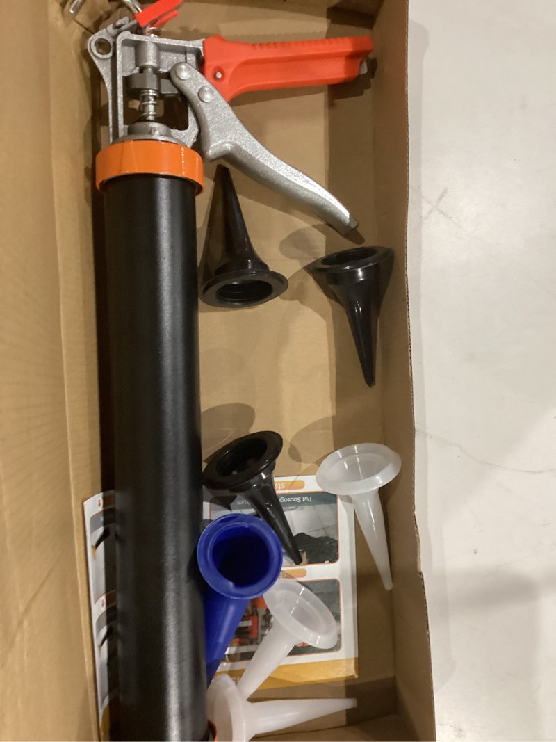 Condition photo showing As Is for sausage tube caulk gun,20 oz sausage pack/10 oz cartridge adhesive dual-purpose,18:1 thrust,15” aluminum sealant hand caulking gun with 6 cone nozzles and bent tip (black) 1 pack