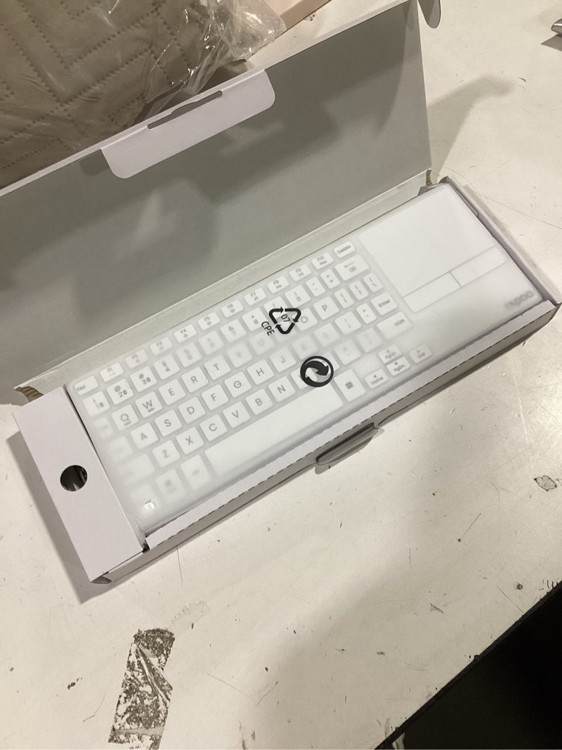 Condition photo showing Good Condition for Rapoo Portable Wireless Keyboard with Touchpad, Multi-Device HTPC Keyboard for PC-Connected TV/Tablet/Steam Deck/Gaming Console/Raspberry Pi/Mini PC - Support Touch Gestures for Windows & Mac White