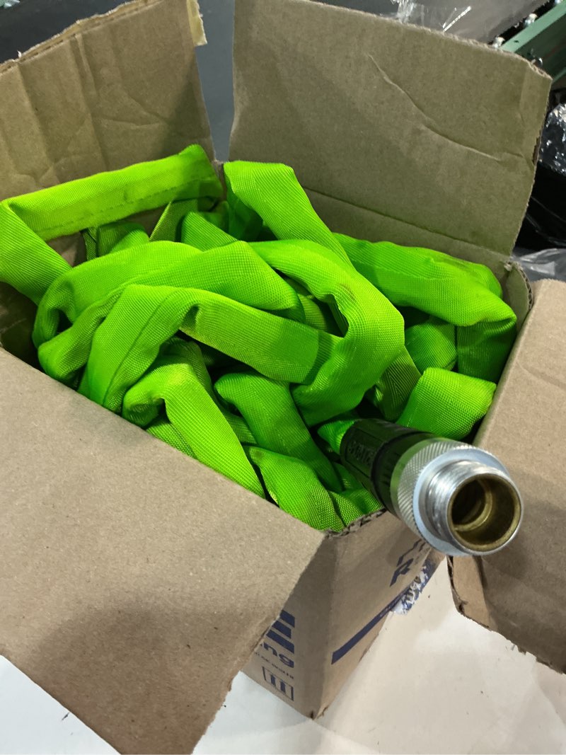 Condition photo showing As Is for zero-g 4001-100 garden hose, 5/8" x 100', gray zero-g 5/8" x 100'