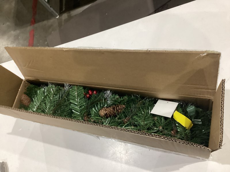 Condition photo showing Good Condition for national tree company 9 ft pre-lit crestwood spruce artificial christmas garland, christmas decoration with glitter, pinecones, red berries, 50 clear lights, 180 tips, green plug in tree