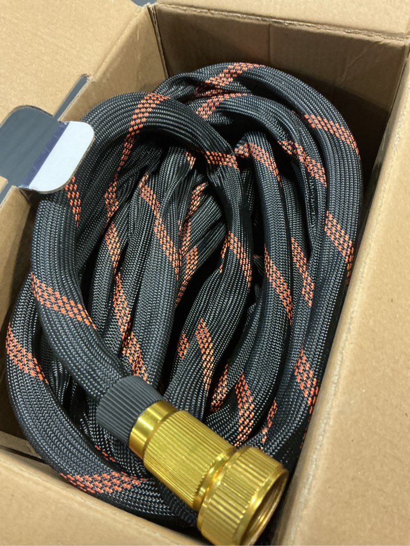 Condition photo showing Good Condition for flexible garden hose 100 ft, ultra lightweight water hoses w/10 function sprayer and 3/4" brass fittings, kink-free, sturdy, abrasion resistant for yard, lawn, outdoor and gardening(black orange) 100ft black orange