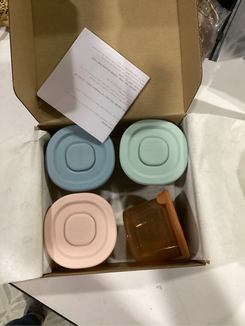 Condition photo showing New/Like New for moonkie silicone baby food containers | 4 oz baby food storage jars with airtight lids | reusable baby food jars, freezer,microwave and dishwasher safe, perfect for infant & toddler 4pack 4 ounce (without labels & pen)