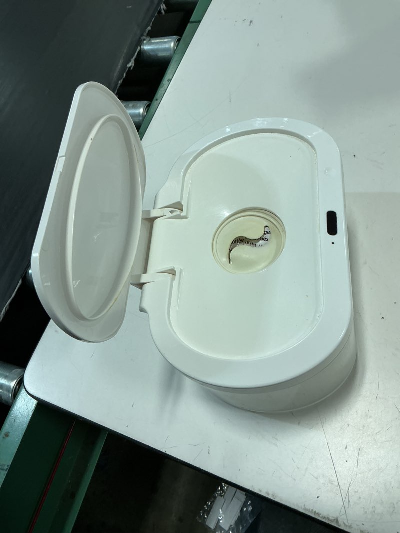 Condition photo showing As Is for munchkin touch free baby wipe warmer with nightlight & motion sensor, white (pack of 1) warmer