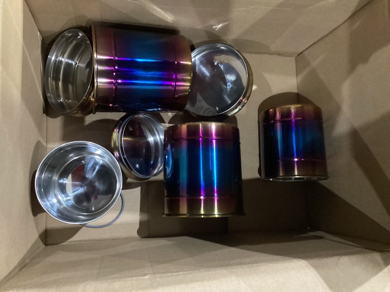 Condition photo showing item condition for amici home rainbow metal storage canister | set of 2 | airtight lid | 38 & 64 ounce capacity | modern home décor | decorative metal canisters for kitchen countertop