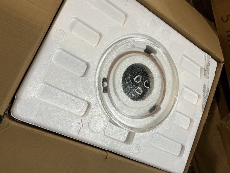 Condition photo showing As Is for FRIGIDAIRE 0.7 Cu. ft. New Countertop Microwave Oven - Black