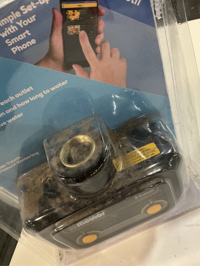Condition photo showing As Is for melnor 2 output port digital hose end timer