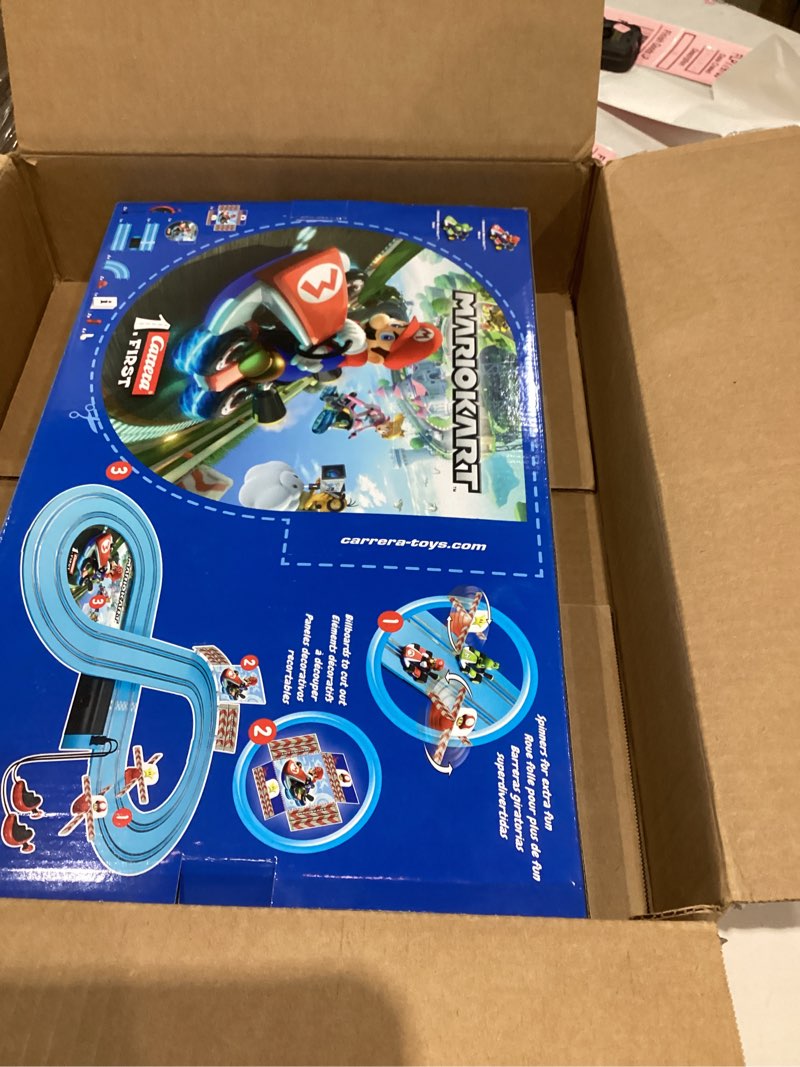 Condition photo showing New/Like New for carrera first mario kart - slot car race track with spinners - includes 2 cars: mario and peach - battery-powered beginner racing set for kids ages 3 years and up