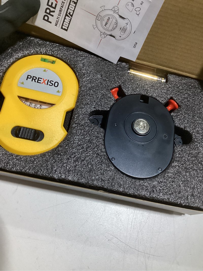 Condition photo showing Good Condition for prexiso multi surface laser level led light vial, 30ft horizontal & vertical line laser with wall mount base, 2 pins, 10 sticker, 2 aa batteries for hanging frames & picture, construction wall writing