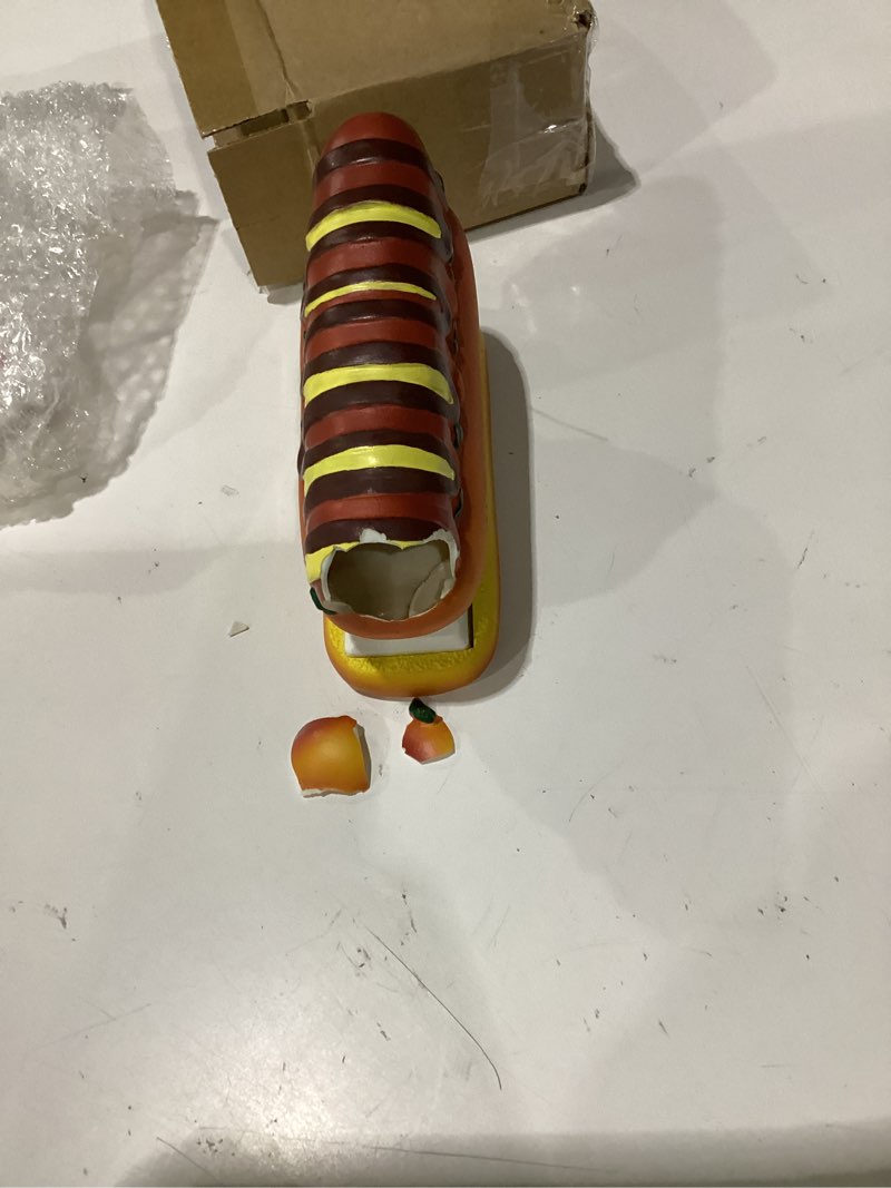 Condition photo showing As Is for hot dog stapler includes 1000 staples novelty hotdog desktop stapler fun desk accessory home office decor ideal holiday or stocking stuffers for teachers, students, and office workers, damaged