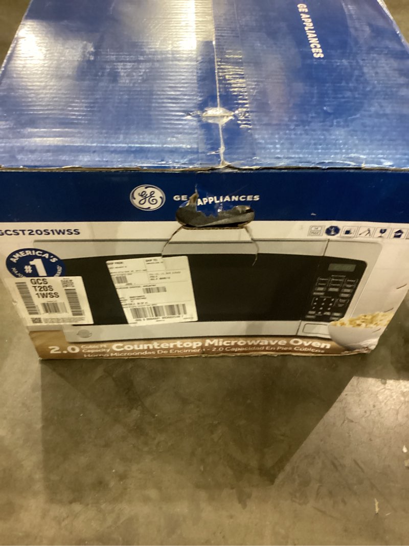 Condition photo showing As Is for GE Countertop Microwave Oven,1, 200-watt Capacity, 2.0 Cubic Ft., 8 Auto Setting Cooking Settings, Child-Lock Technology, Kitchen Essentials for the Countertop, Dorm Room or Apartment, Stainless Steel 2.0 Cu.Ft. Stainless Steel