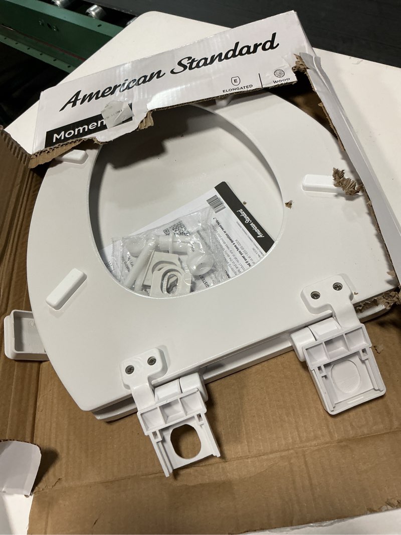 Condition photo showing As Is for american standard moments wood white elongated soft close toilet seat
