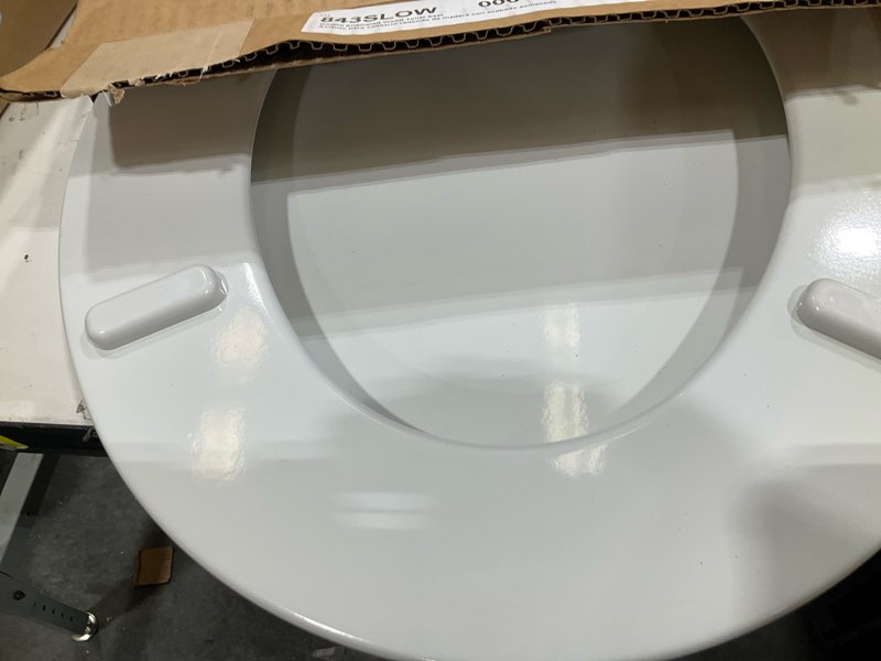Condition photo showing Good Condition for mayfair linden slow close toilet seat, non slip heavy duty wood, easy install, round, white round traditional hinge