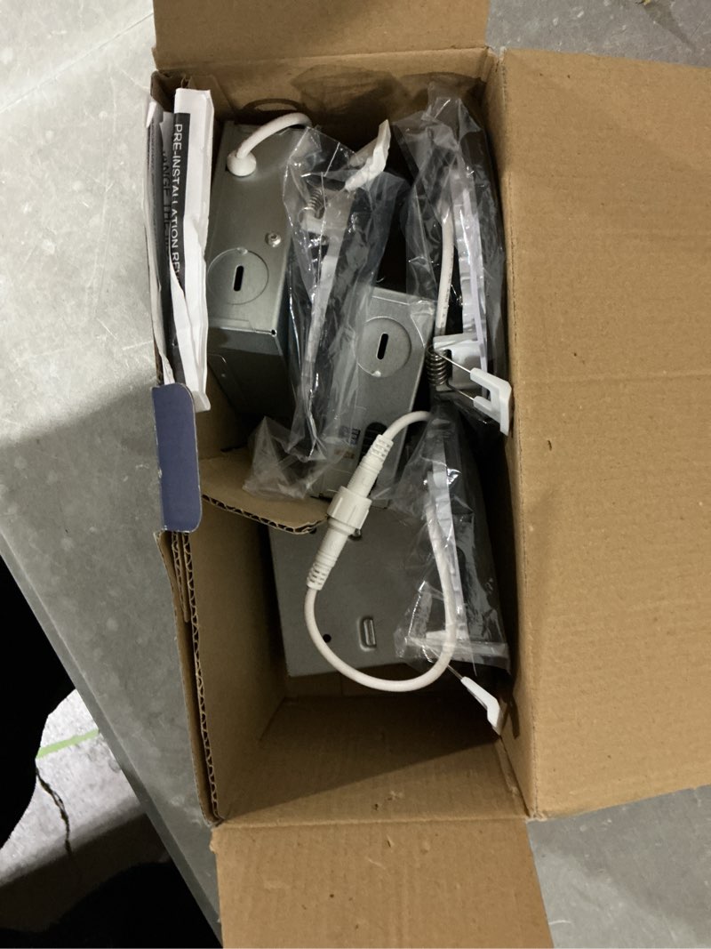 Condition photo showing As Is for utilitech set select white/ black 4-in 540 -lumens switchable white round dimmable led canless